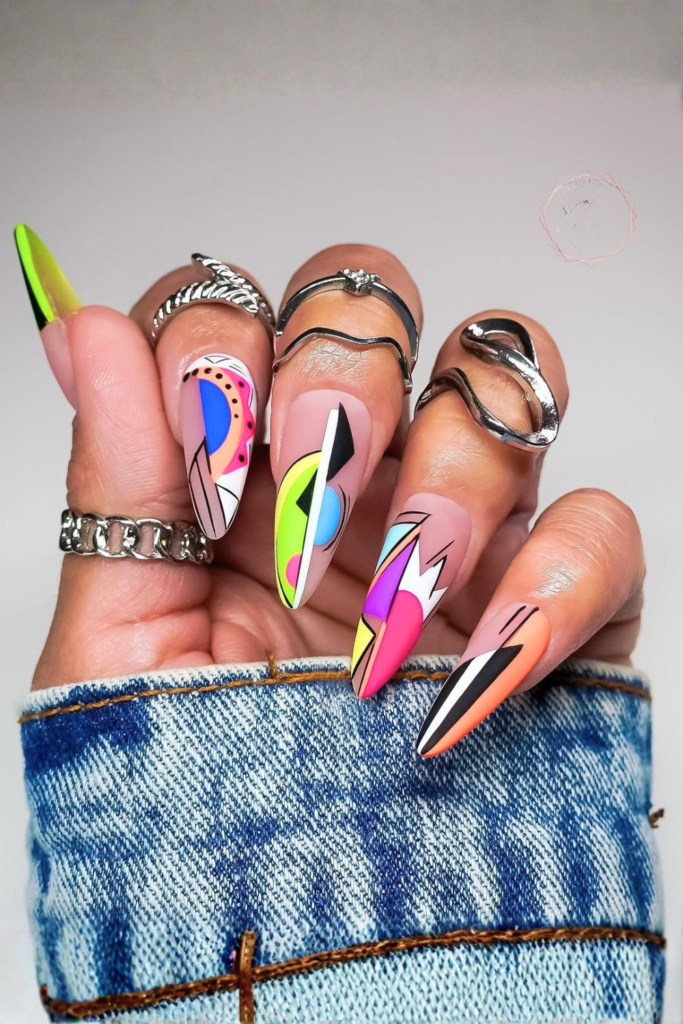 Abstract colorful nail art with bold shapes and trendy funky nail design ideas