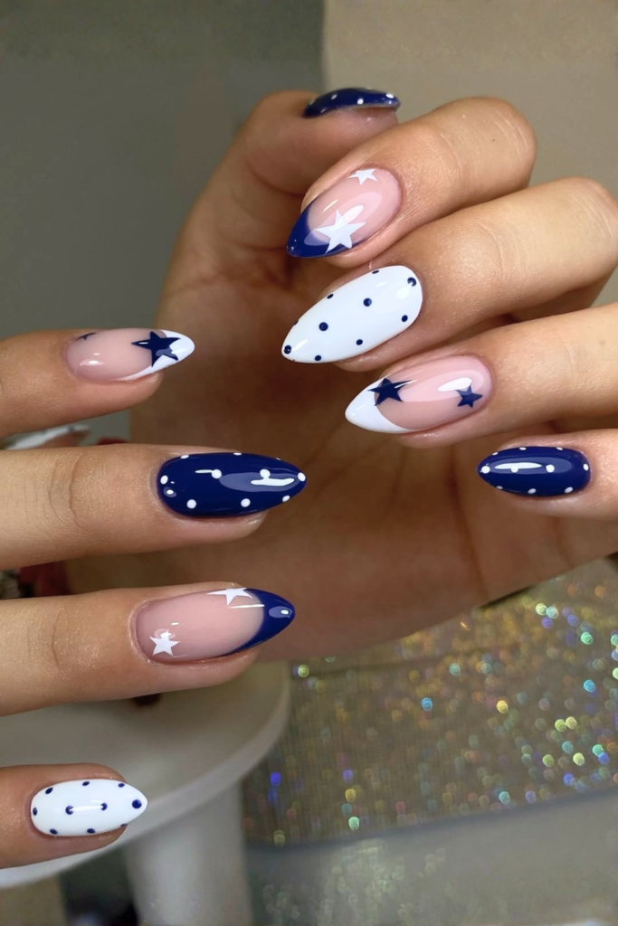 almond shaped blue nails with white accents elegant manicure