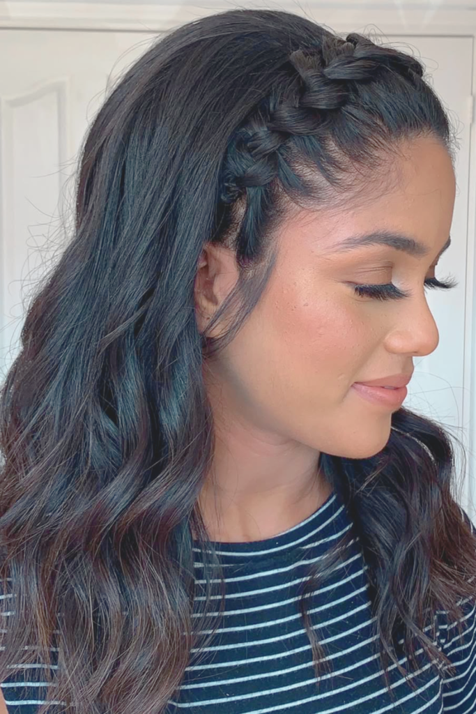 Braided headband hairstyle with beach waves for festival look