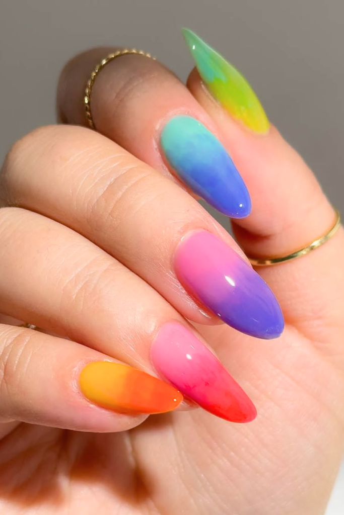 Bright ombre summer nails with smooth color fade and trendy nail style