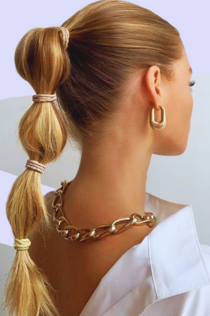 Bubble ponytail with elastics trendy festival hairstyle idea