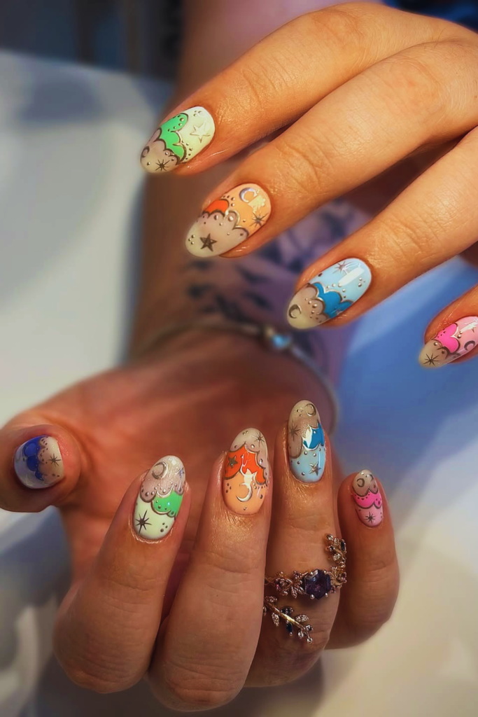 Celestial star and moon festival nails with cosmic nail art design and dreamy aesthetic