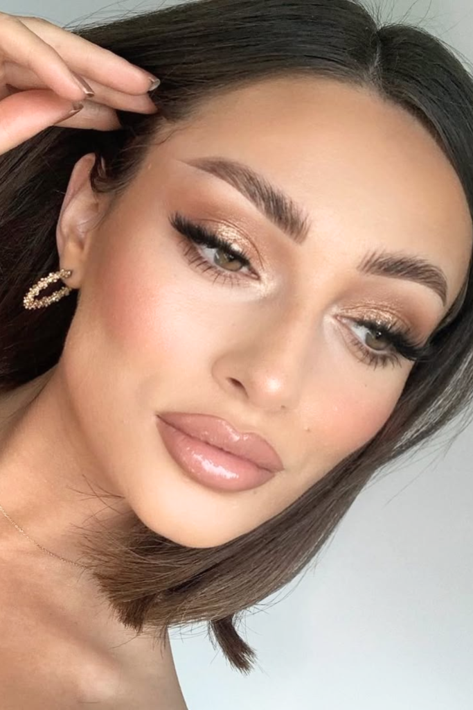champagne shimmer soft glam makeup with glowing skin and radiant highlight