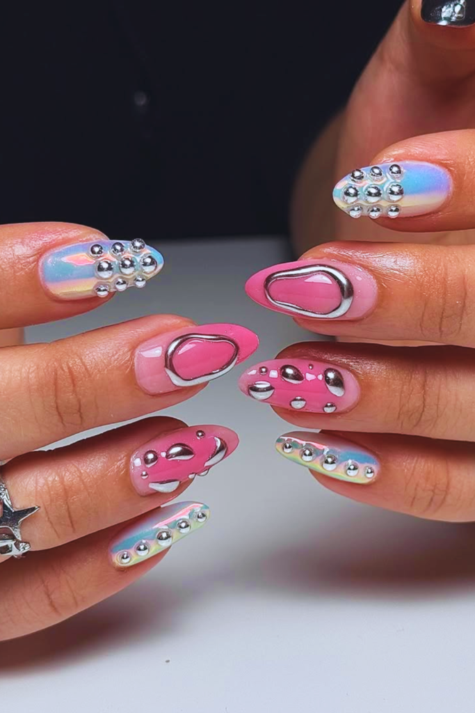 Chrome festival nails with glazed donut finish and high shine reflective nail design trend