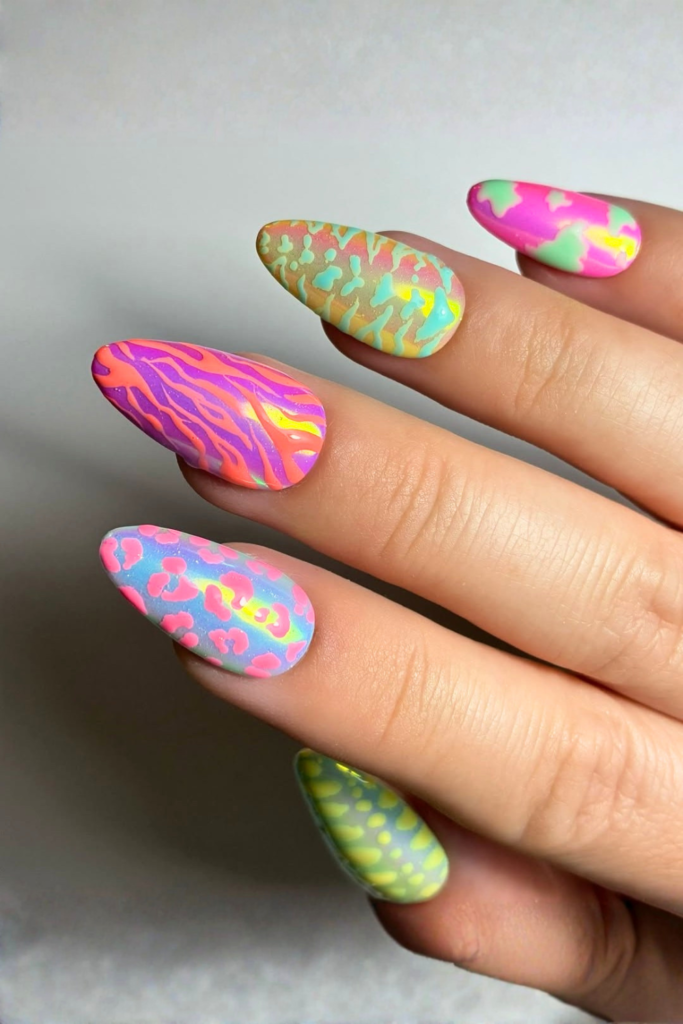Chrome and bright color nails with reflective finish and trendy summer nail design