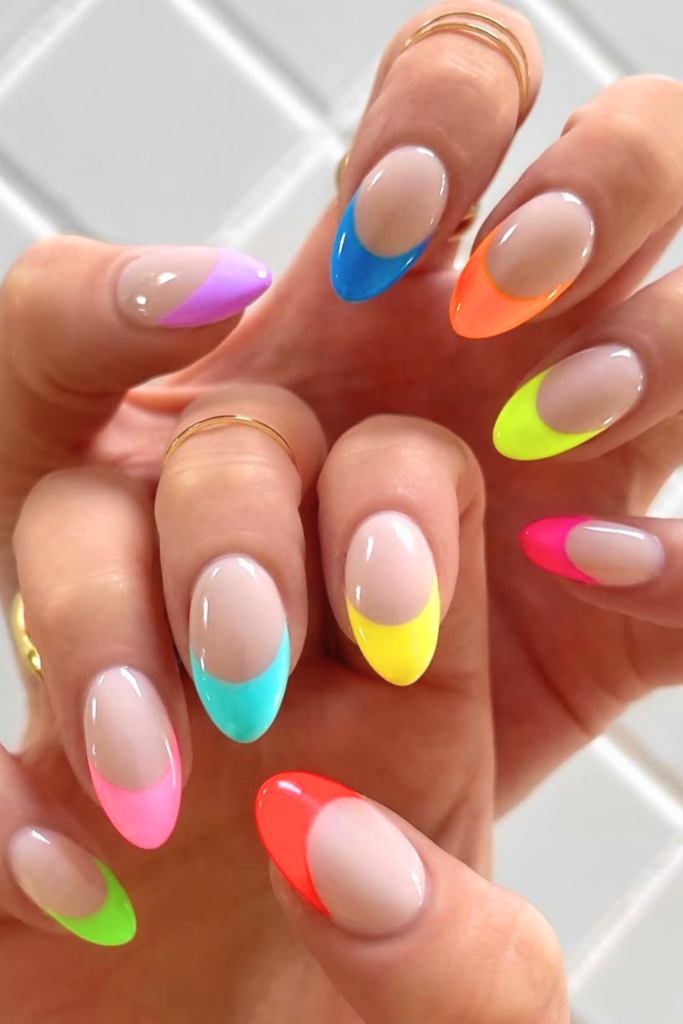 Colorful French fade nails with soft blended tips and bright nail design