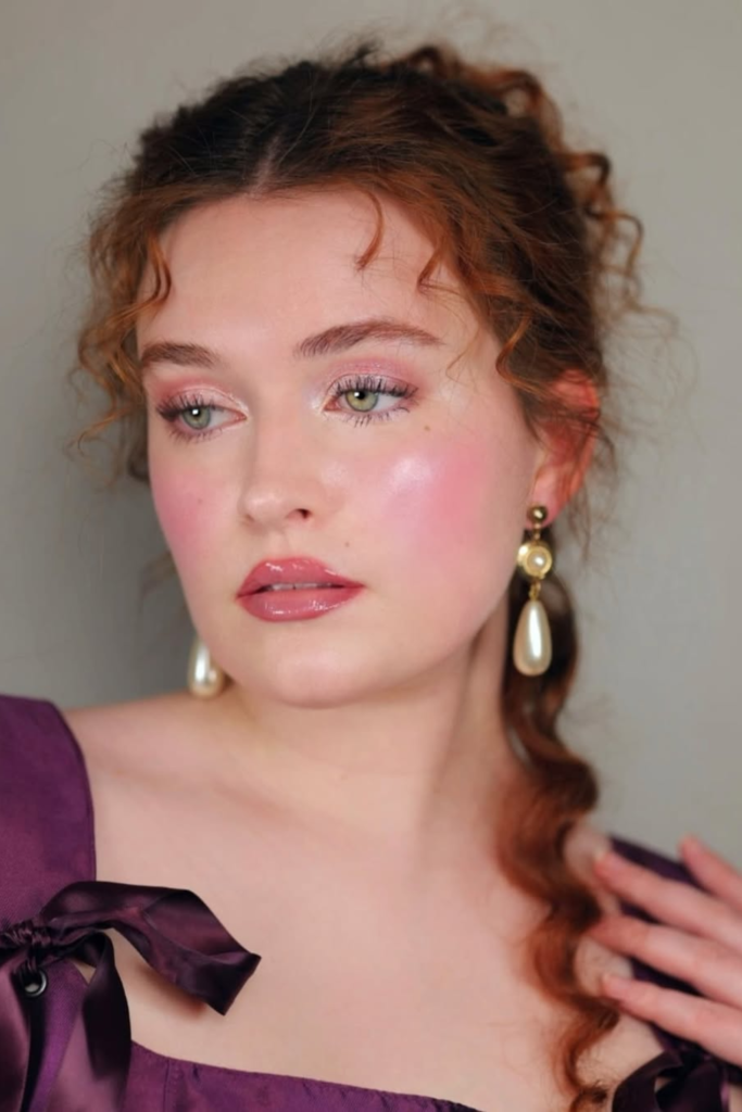 ethereal makeup look with soft highlight and luminous glowing skin finish