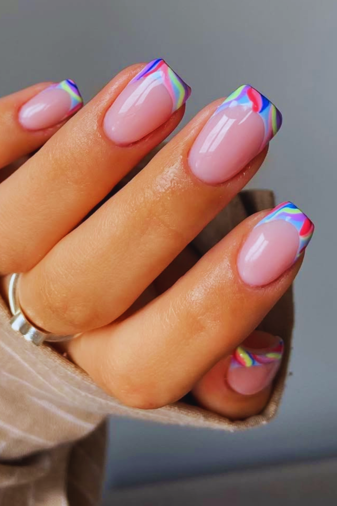 Funky French tip nails with colorful tips and modern bright nail design for summer