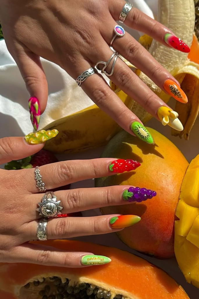Funky fruit nail designs with colorful details and playful summer nail art