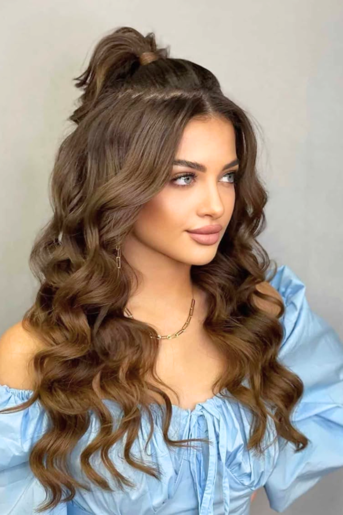 Half up high ponytail voluminous festival hairstyle trend