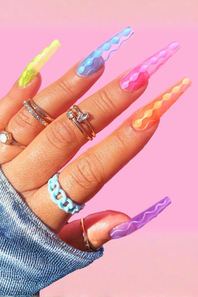 Jelly color summer nails with glossy transparent finish and bright nail look