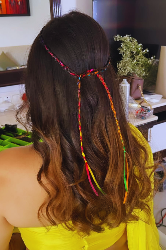 Loose waves with micro braids festival hair idea for summer boho look