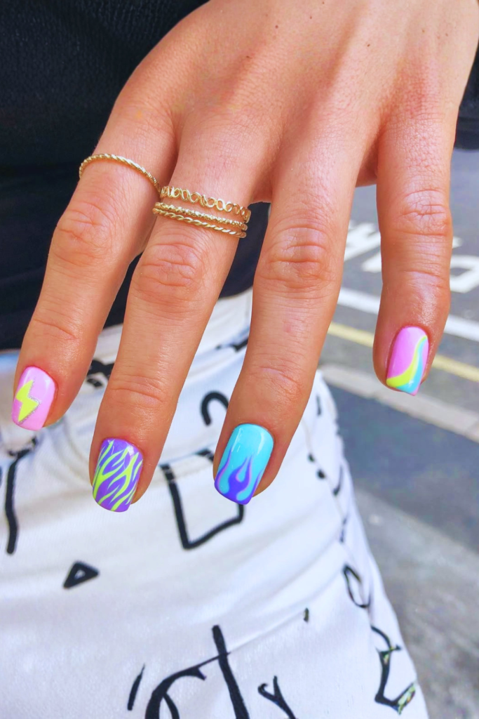 mismatched summer birthday nails with different designs and aesthetic nail style