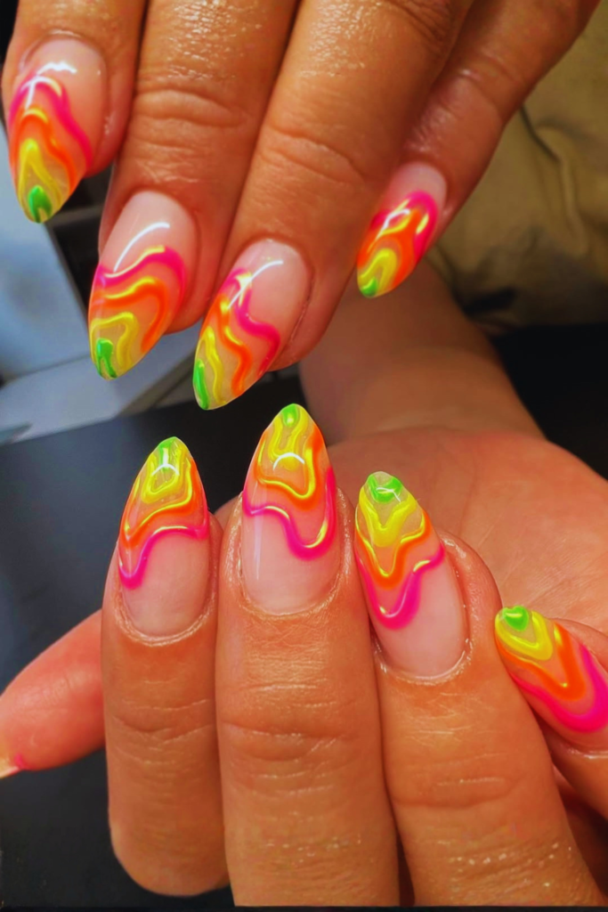 Bright neon swirl funky nails with colorful summer design and bold abstract nail art