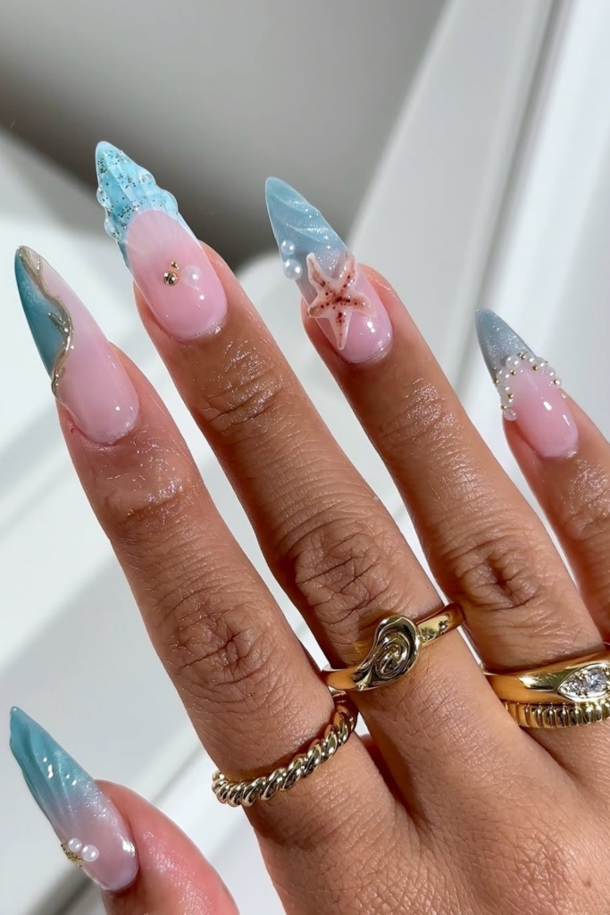 ocean blue chrome summer birthday nails with glossy reflective water inspired finish