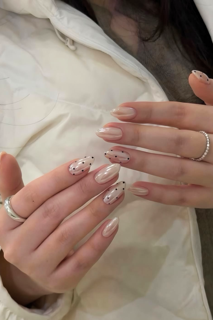 pearl glazed summer birthday nails with soft chrome shine and smooth glossy texture