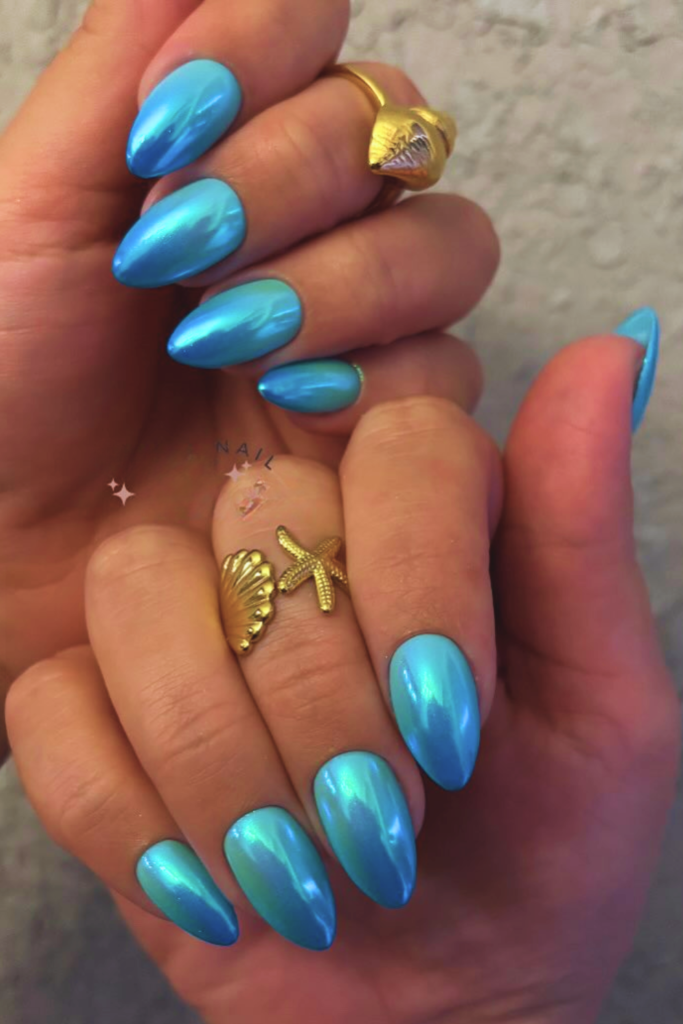 aqua blue chrome nails inspired by pool water glossy nail design