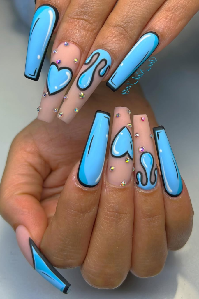 Pop art comic nails with bold outlines and graphic colorful nail design