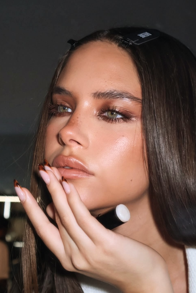 soft bronze makeup look with sun kissed glow and radiant skin finish