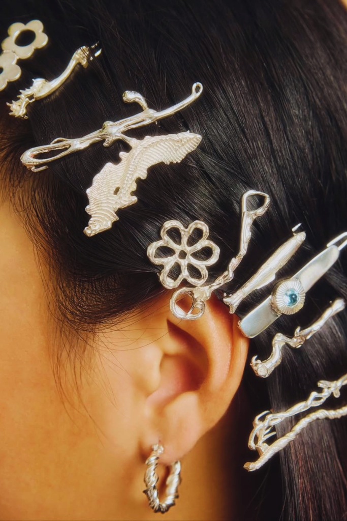 Straight hair with clips minimal aesthetic festival hairstyle