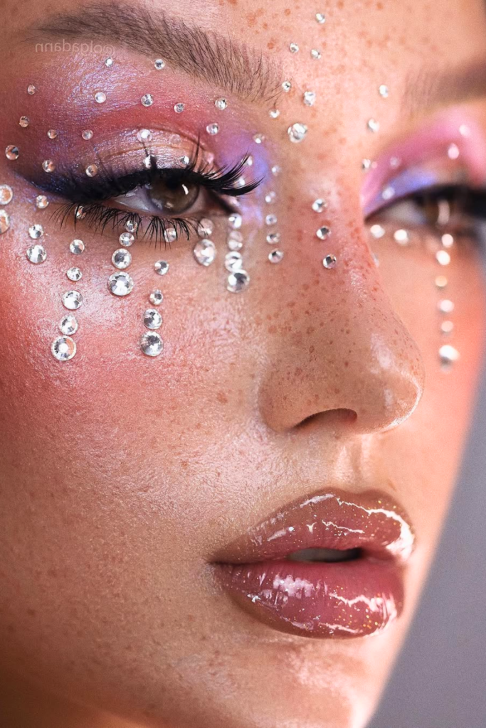 subtle rhinestone makeup with fairy aesthetic and glowing dewy skin
