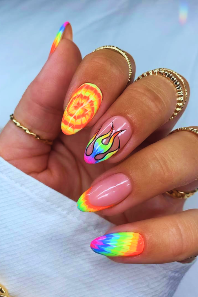 Tie-dye festival nails with colorful blended patterns inspired by summer festival style