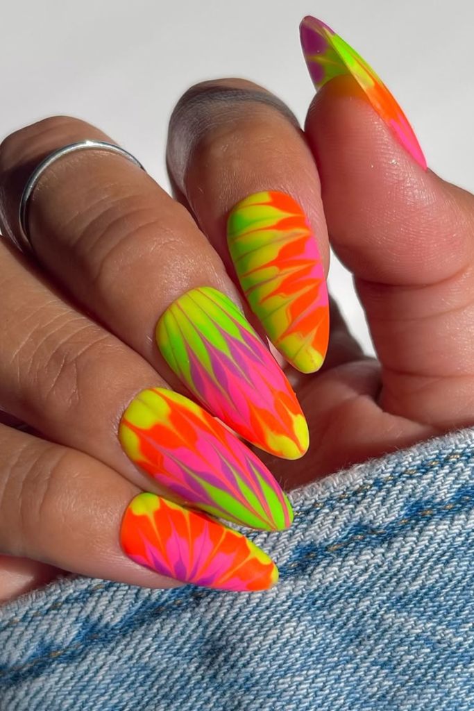 Tie dye summer nails with blended colors and trendy funky nail design
