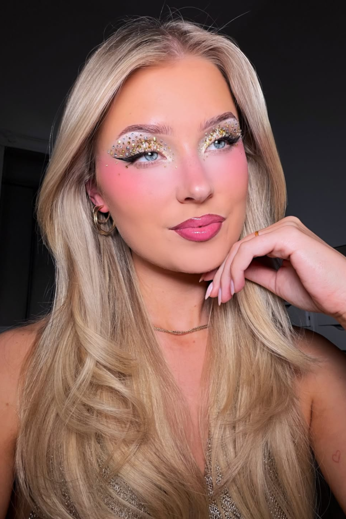 whimsical fairy makeup with soft shimmer eyelids, dewy glowing skin and pastel aesthetic look