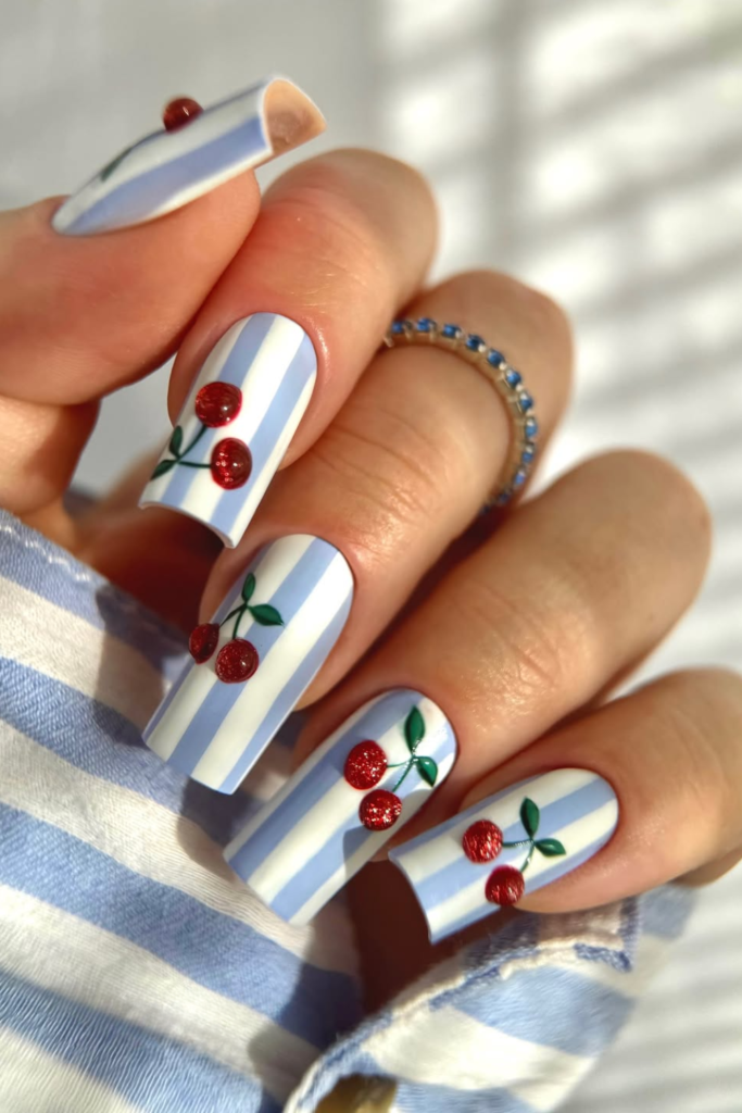white nails with blue line art modern minimal nail style