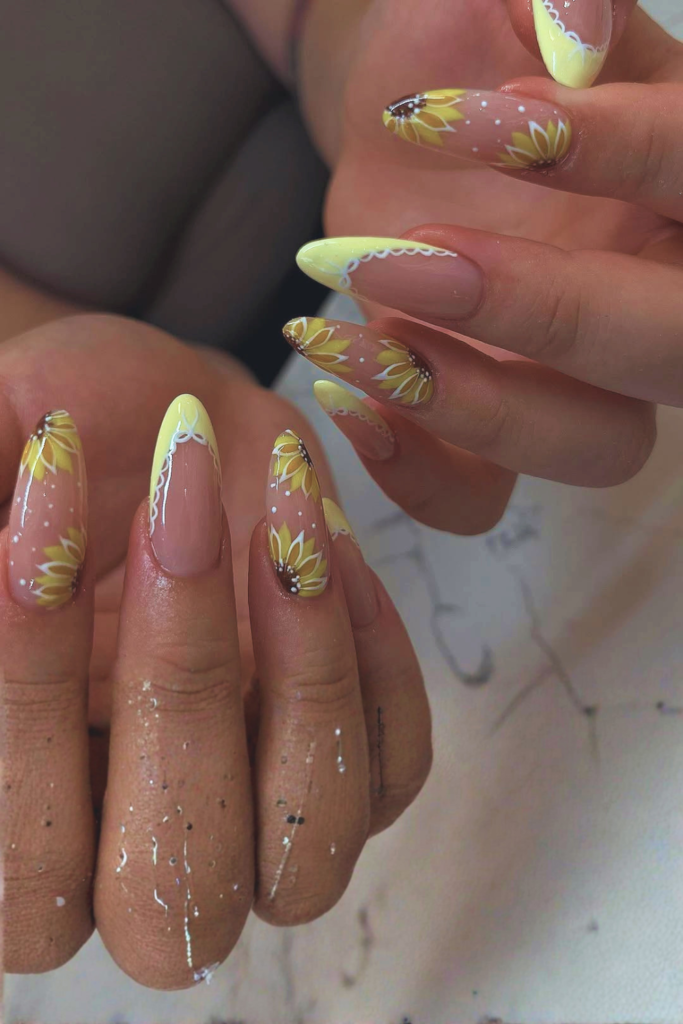 glossy almond nails with sunflower art smooth elegant finish