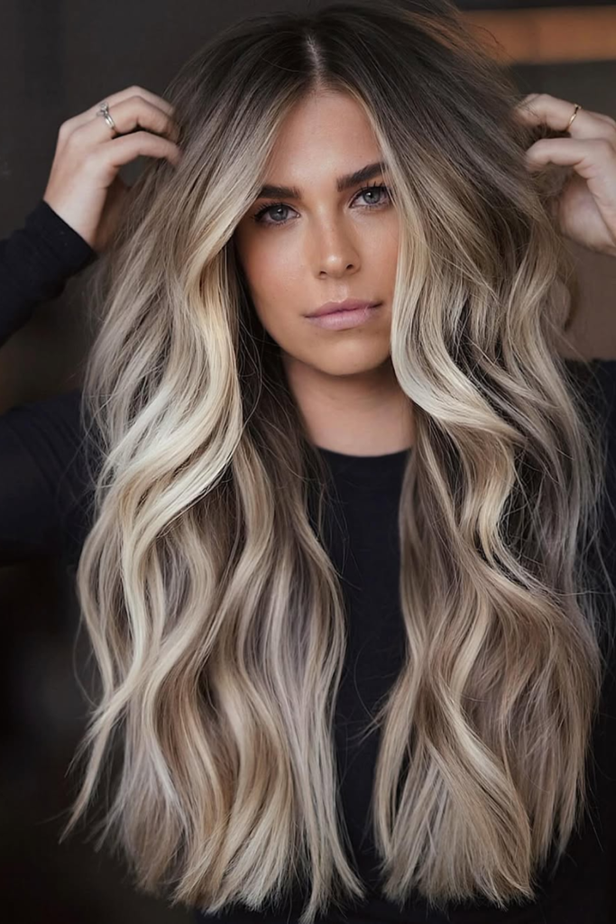 Beach blonde balayage with soft summer waves
