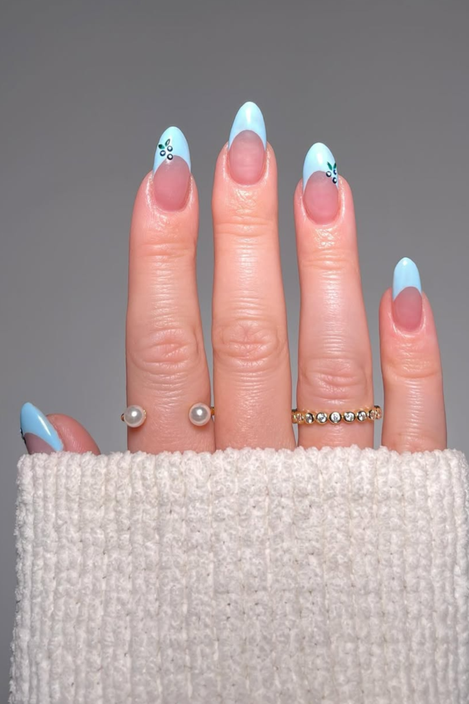Blue pastel manicure with creamy nude base