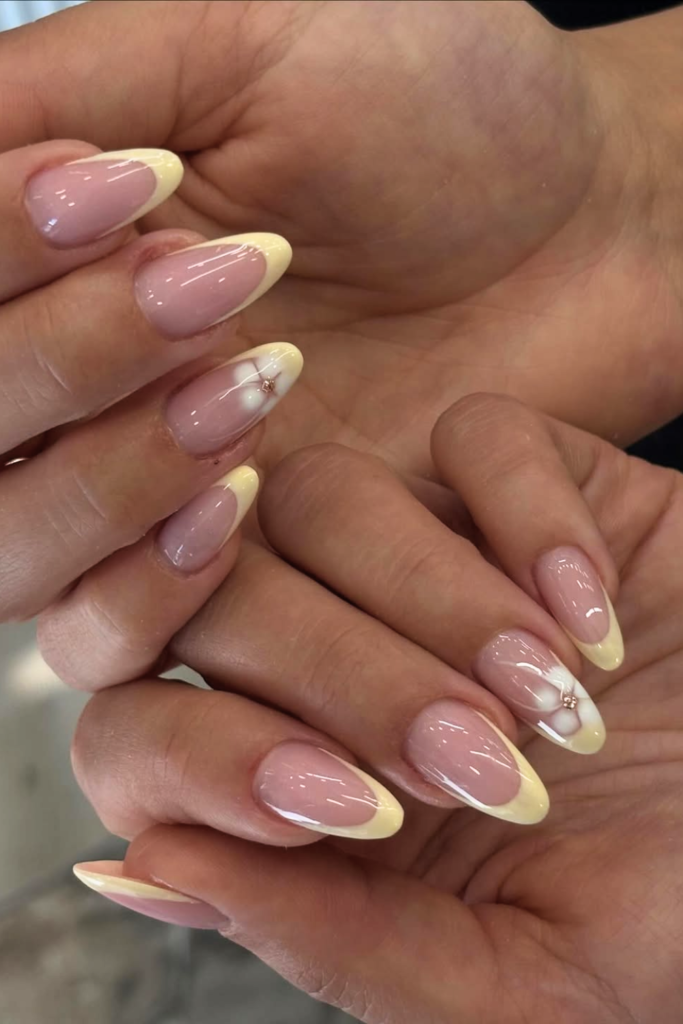 Butter yellow manicure with pastel nail tips