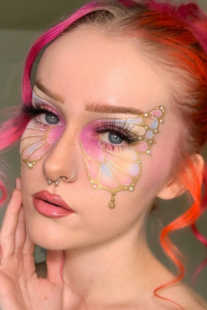 Butterfly fantasy makeup with pastel shimmer and crystal accents