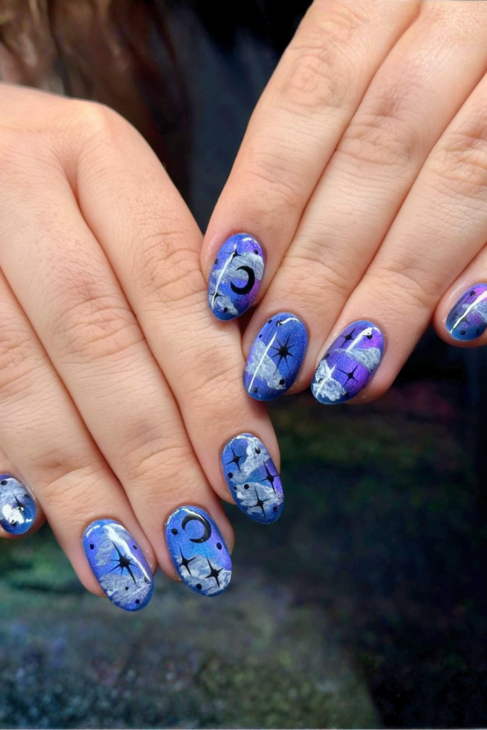 Celestial star nails with glossy nude and silver nail details
