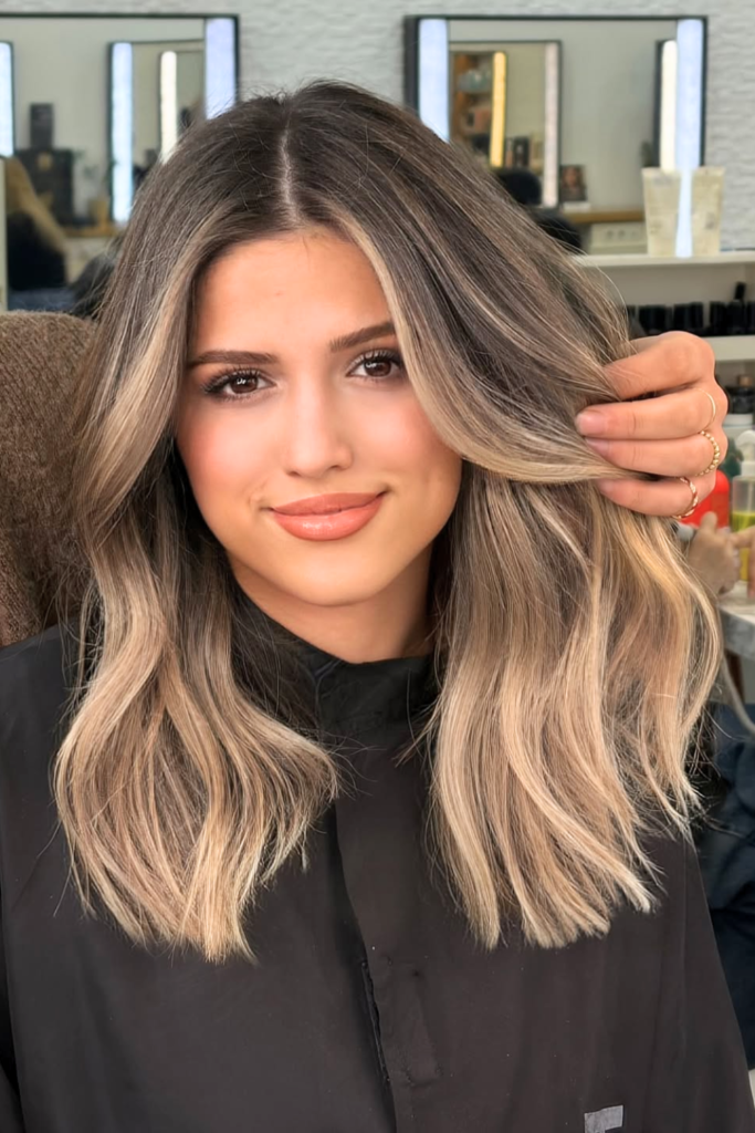 Champagne blonde balayage wig with feminine soft waves