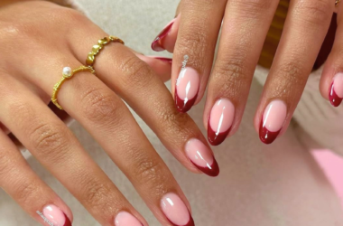 Modern French tip nails with glossy summer manicure