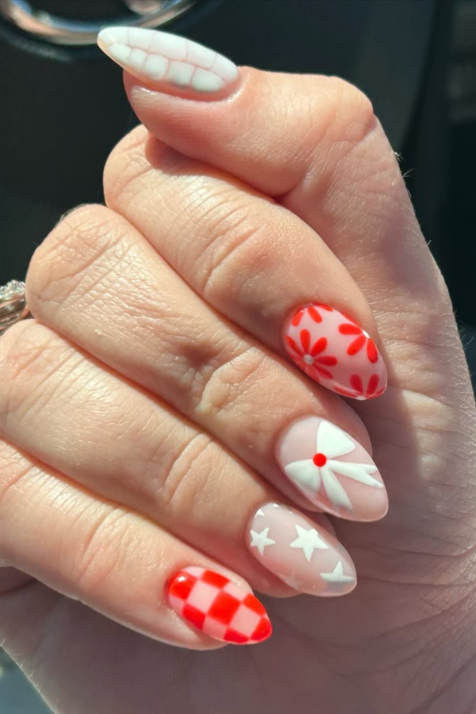Coquette bow nails with cute patriotic summer nail details