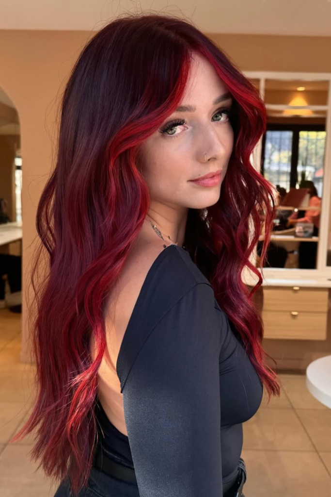 Crimson red wavy hair with deep bold tones
