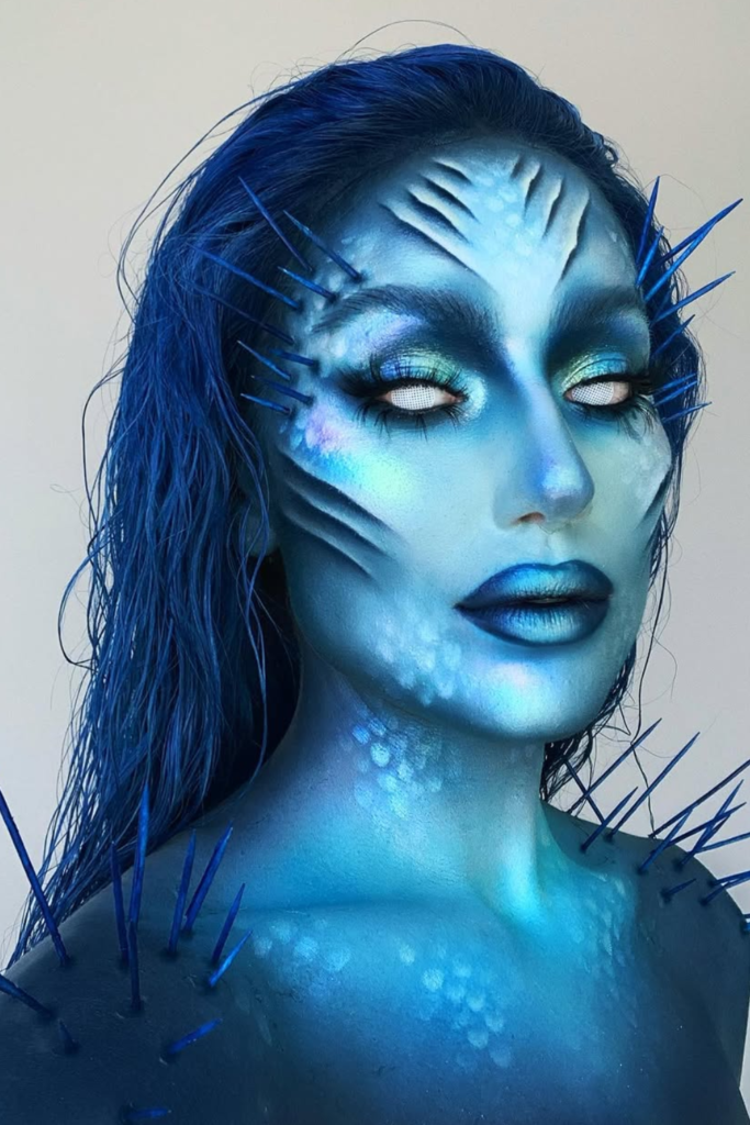 Dark siren makeup with smoky eyes and wet-look glam