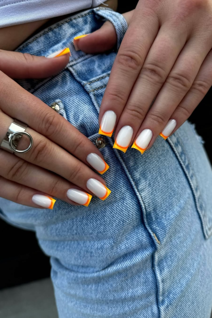 double french tip nails with sunflower accents layered look