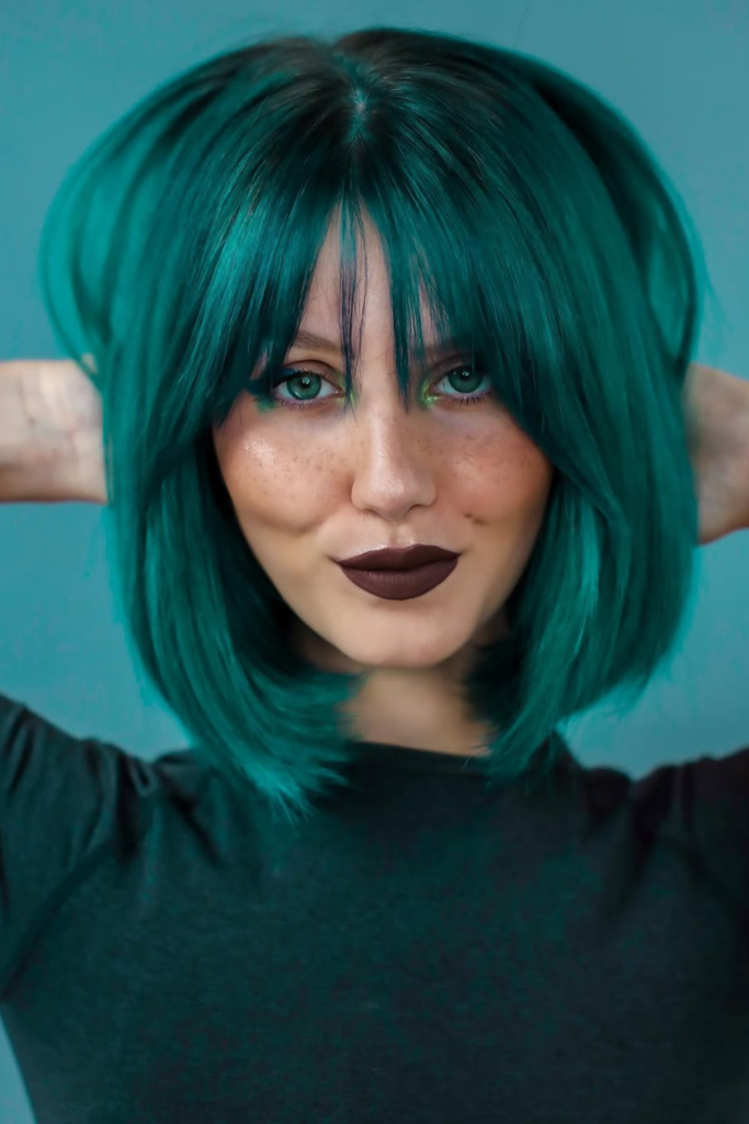 Emerald green hair color idea with rich shine
