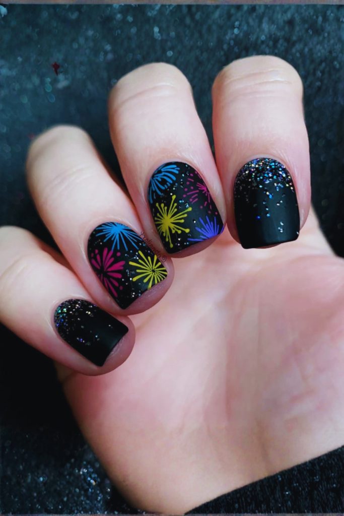 Glitter firework nails with sparkly patriotic manicure accents