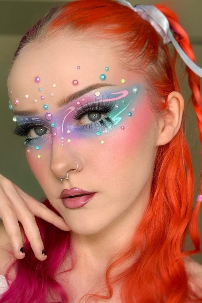 Mermaidcore makeup with holographic shimmer and glossy skin