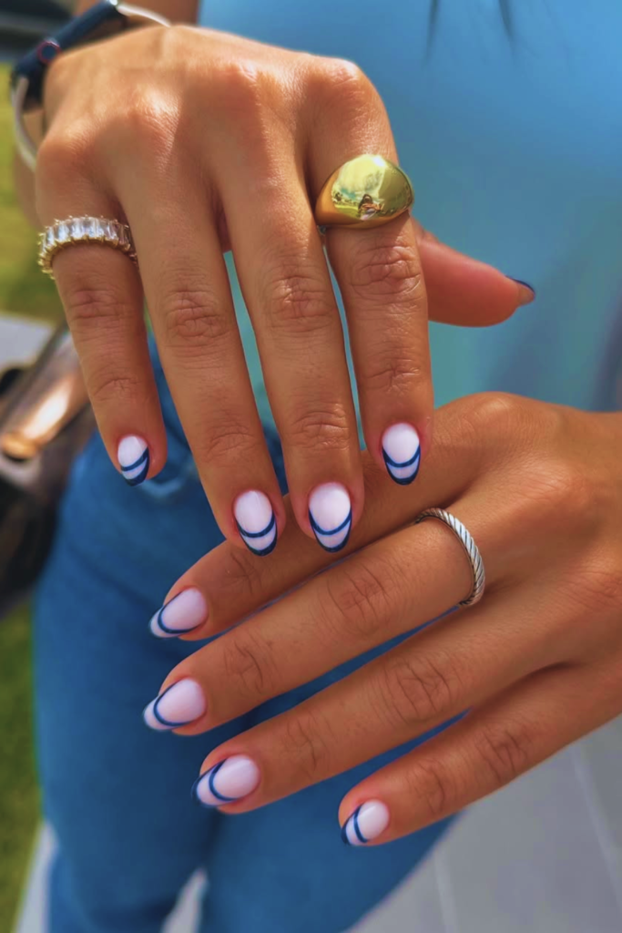 Milky white and navy French tip nails for a classy summer manicure