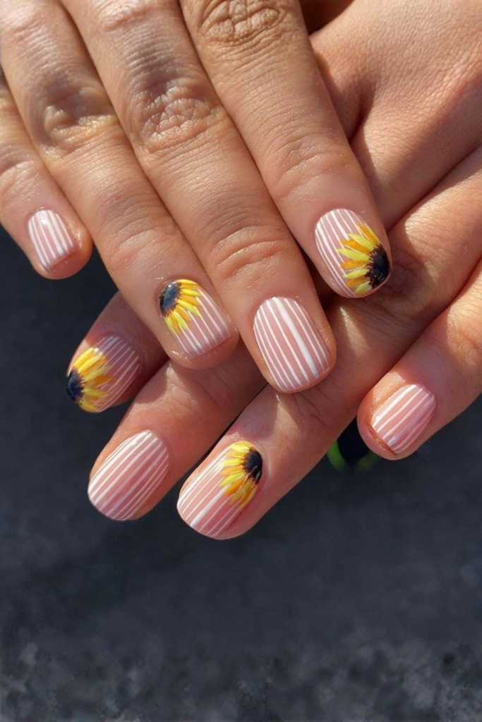 minimal line art sunflower nails clean modern design