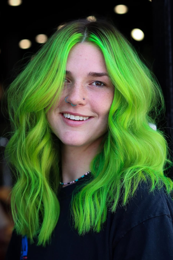 Neon green money piece hair color front highlights