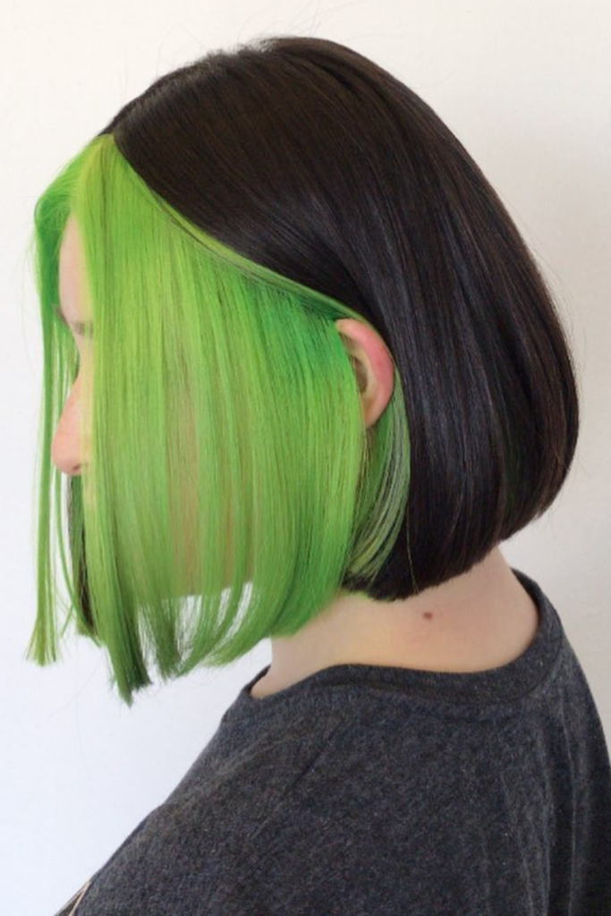 Neon lime peekaboo highlights on black hair