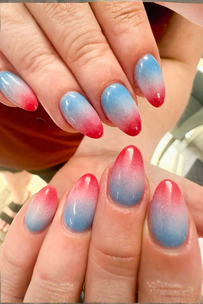Ombre July nails with glossy red and blue gradient manicure
