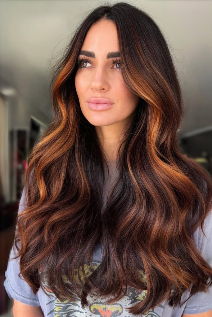 Peachy copper hair with warm glossy tones